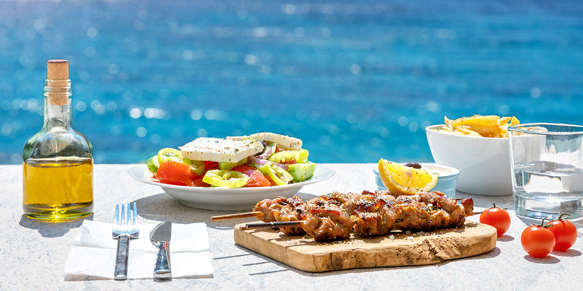 Pauschalreise Rhodos: Essen am Strand